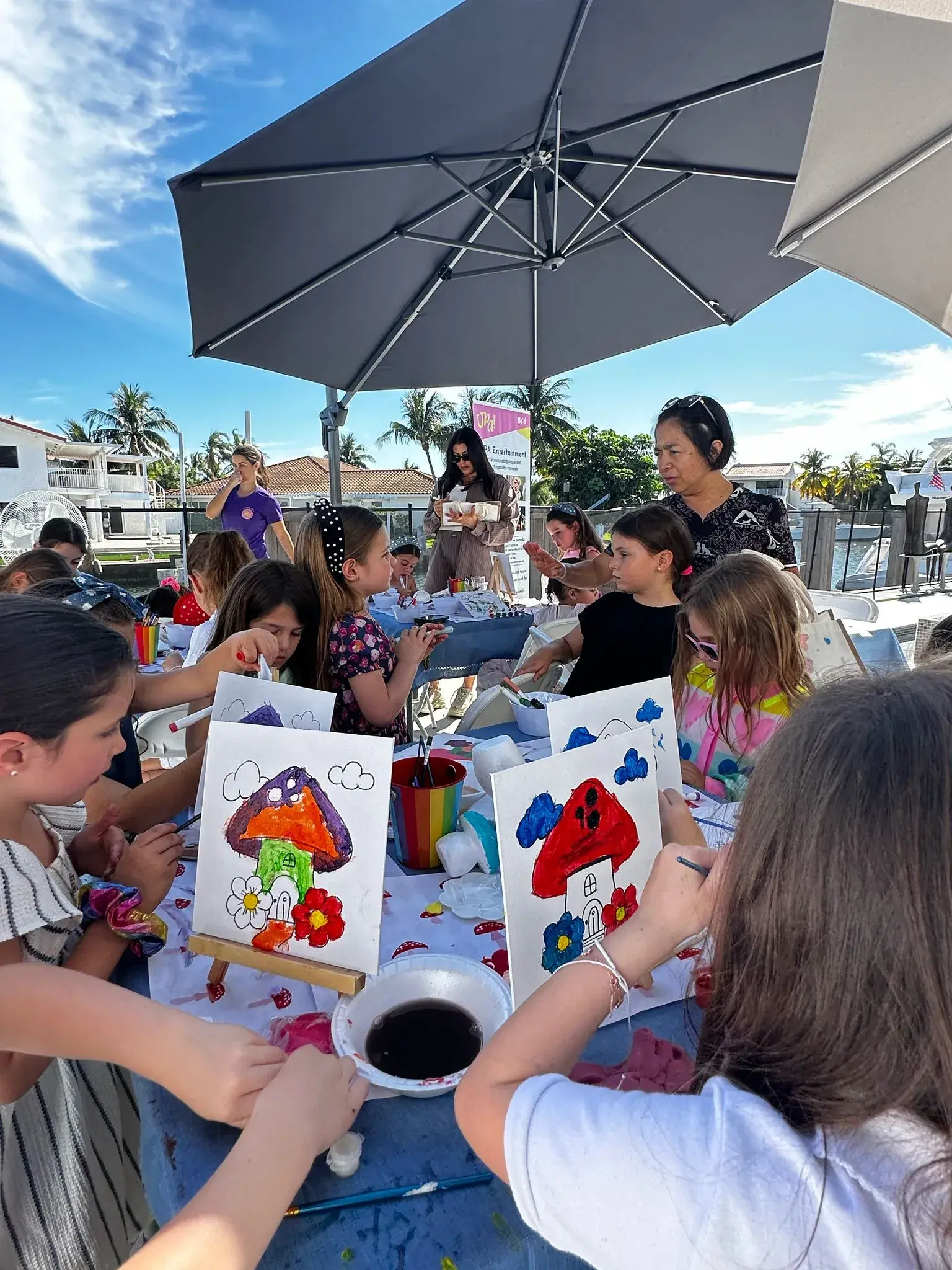 A group of children gathered around a table